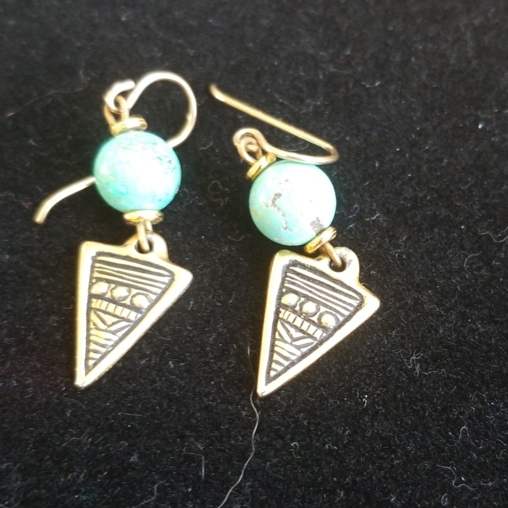 Gold and turquoise colored earrings